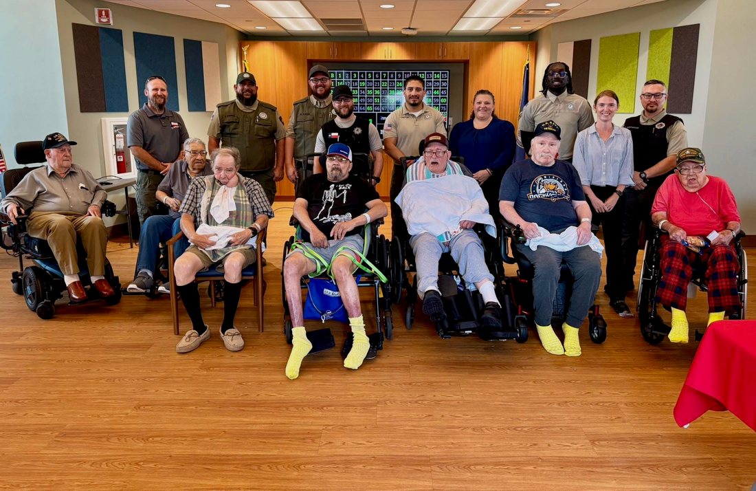 FCI Big Spring staff with residents at a local veterans home